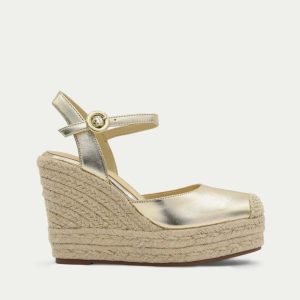 SANDALIA CUÑA ALTA ORO METALIZADO CERRADA