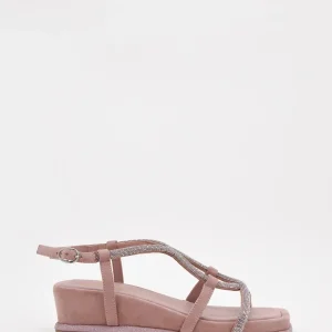 Sandalias planas color rosa y tiras cruzadas con strass