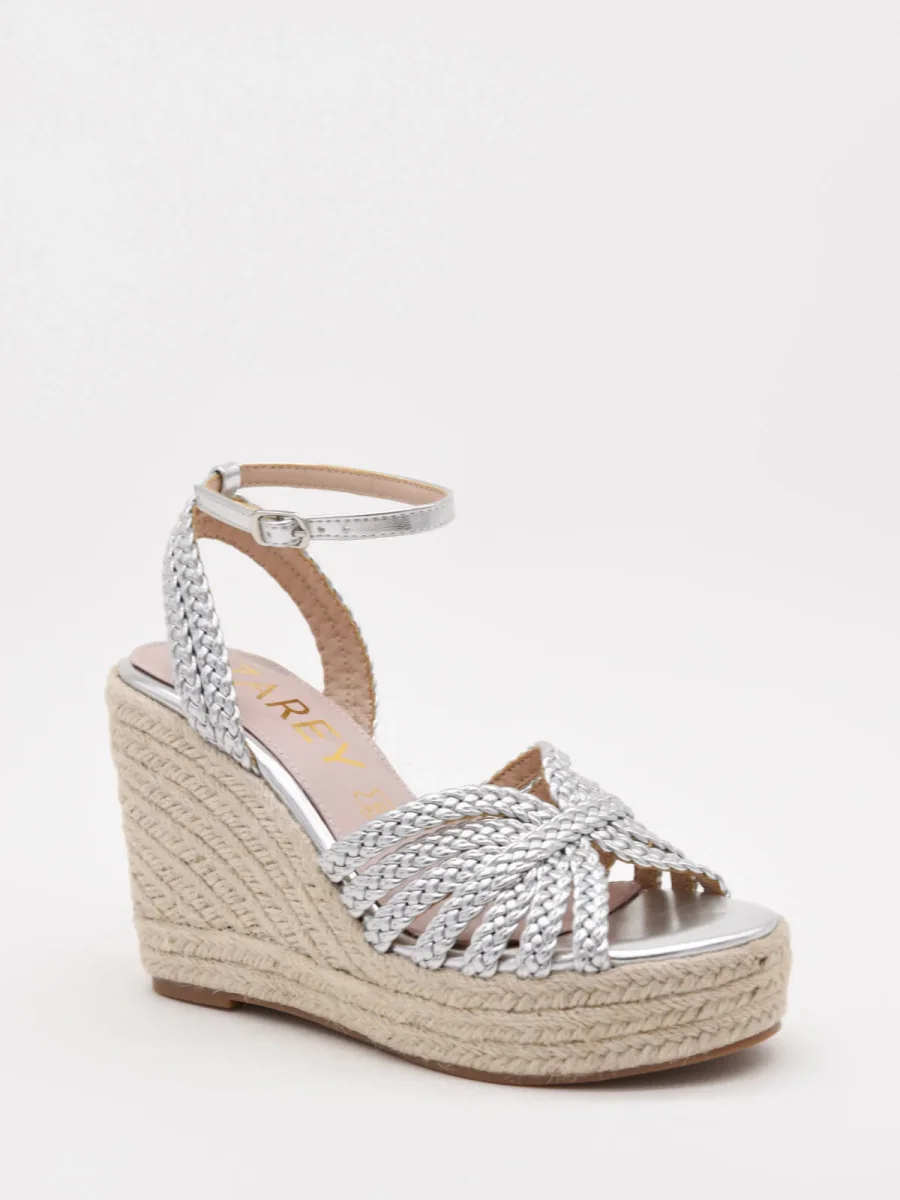 Sandalias plateadas de cuña alta con tiras trenzadas - Imagen 3