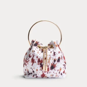 BOLSO BOMBONERA BLANCO VACA CON ASA ARO DORADA
