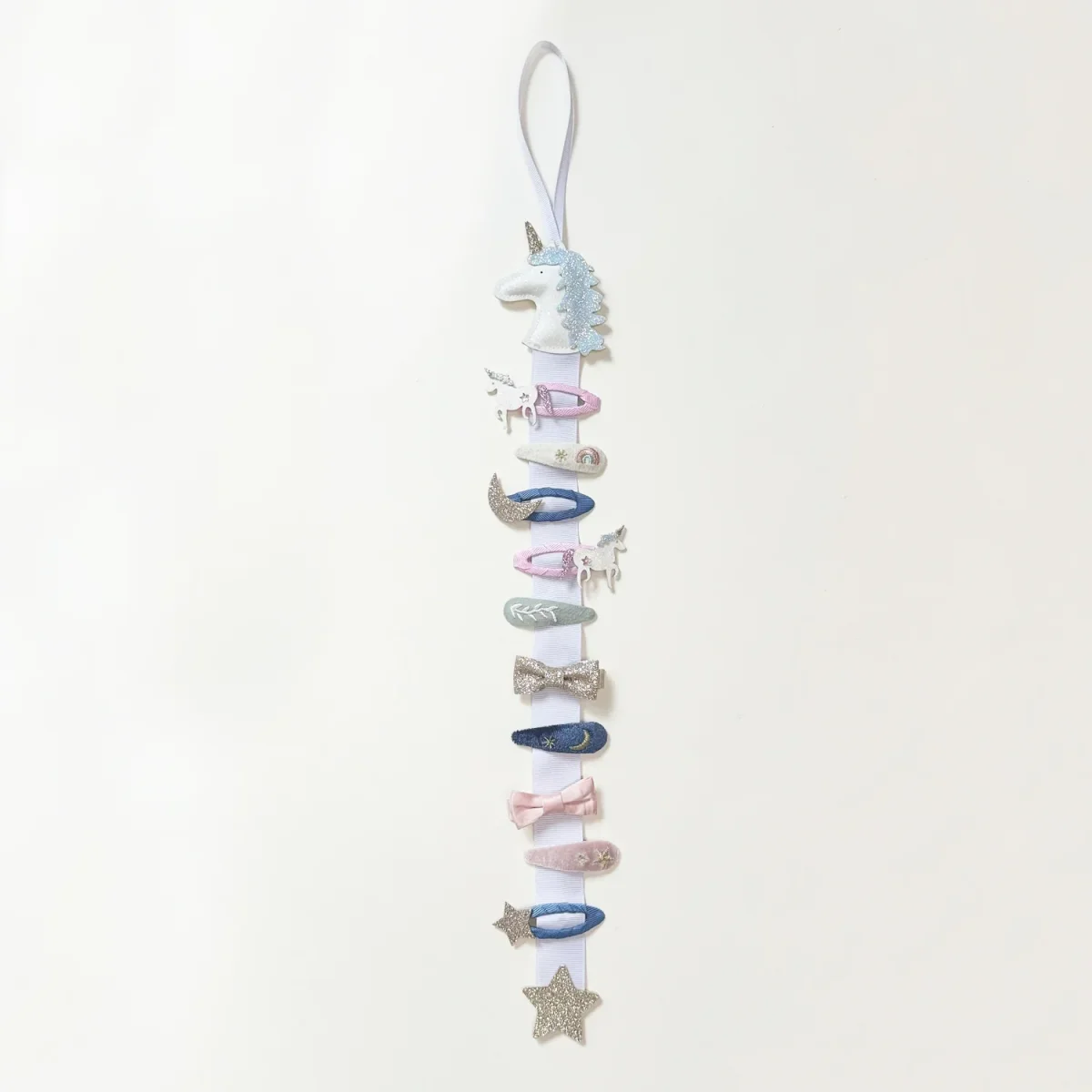 Percha con clip de unicornio